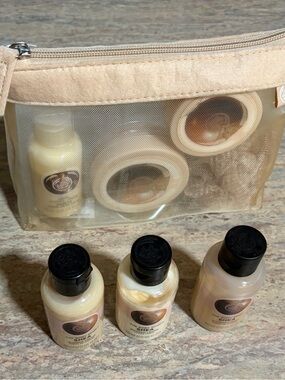 The Body Shop 7-Piece Shea Bath & Body Travel Set in Its Mesh Zippered Bag
